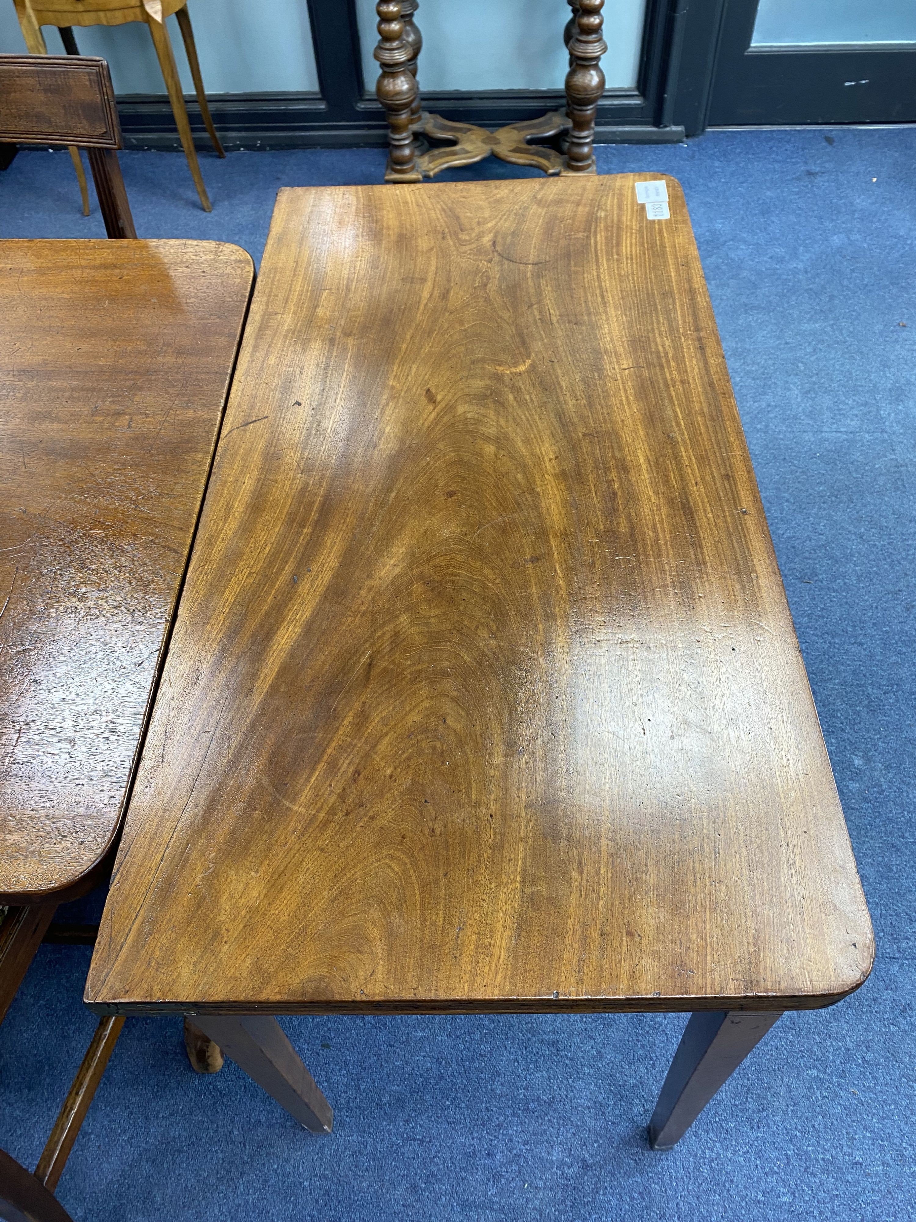 A George III mahogany folding tea table, width 88cm, depth 45cm, height 71cm